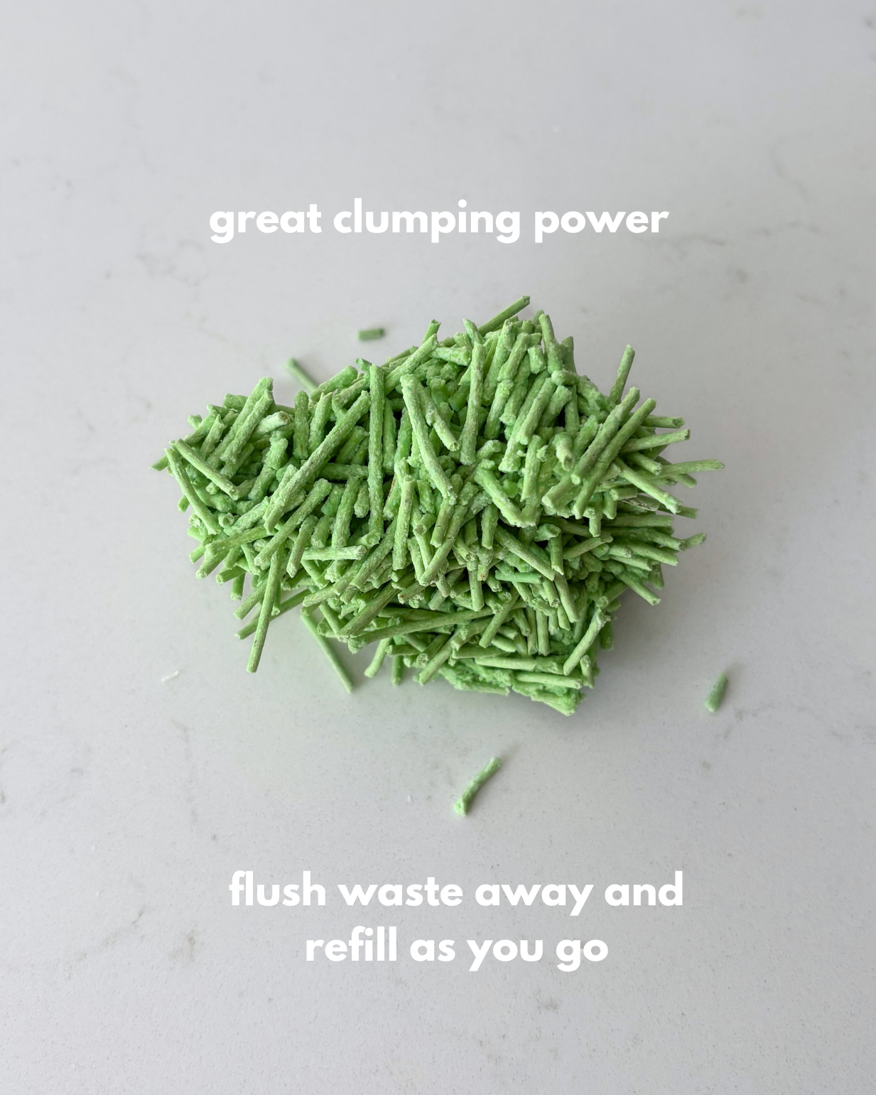 Picture of clumped green tea litter with words "great clumping power and flush waste away and refill as you go"