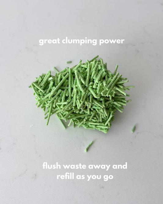 Picture of clumped green tea litter with words "great clumping power and flush waste away and refill as you go"